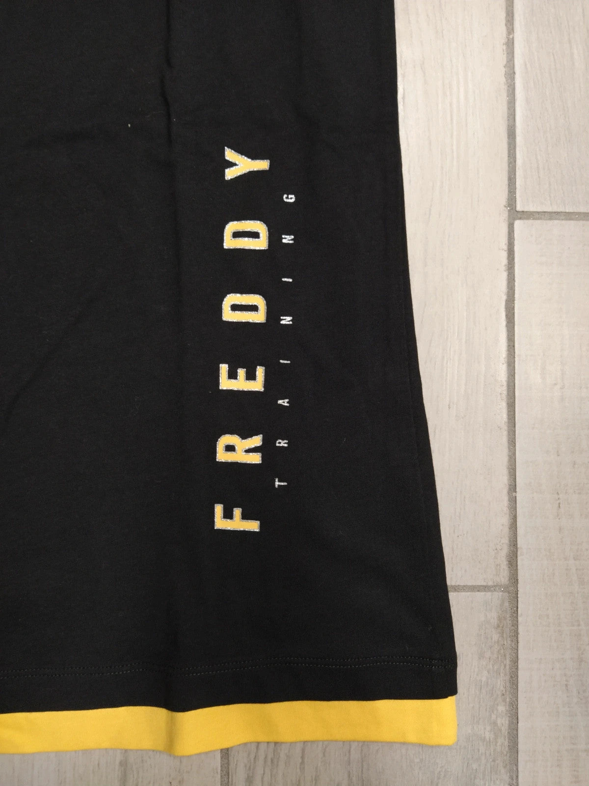 Freddy canotta con scritta laterale donna tg S